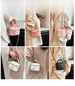 Detail view of heart-quilted mini chain bags showing multiple colors and styling on models