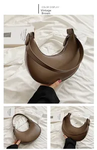 Detail view of the retro coffee crescent shoulder bag with matte leather finish