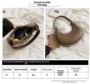 Detailed size chart for crescent shoulder bag with measurements and capacity guide