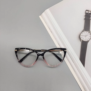 Detailed 45-degree angle of cat-eye frames with black to pink gradient and metal hinges