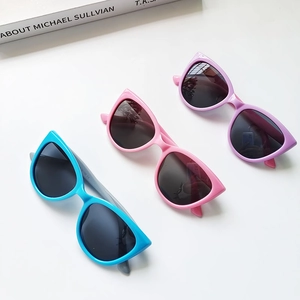 Polarized cat-eye children's sunglasses in blue, pink, and purple with UV protection