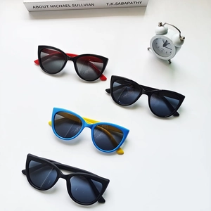 Polarized oval children's sunglasses with retro cat-eye frames in assorted colors