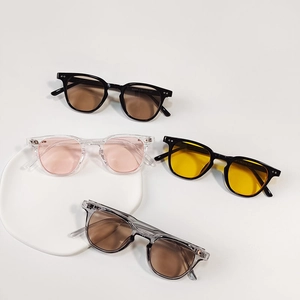 Retro round frame sunglasses for kids with metallic rivets and multi-color lenses