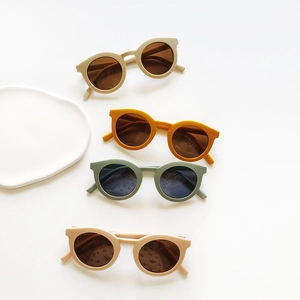 Minimalist matte round frame sunglasses for kids in khaki, yellow, green and pink colors