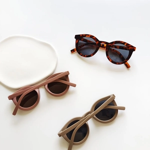 Three pairs of retro round sun glasses for kids in tortoise and pastel matte colors
