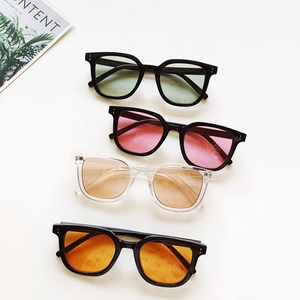 Retro rectangular sunglasses with thick frames and colorful lenses in four vibrant styles