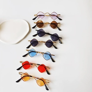 Diamond-shaped children's sunglasses in multiple colors with gold metal frames