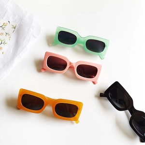 Set of four trendy vintage rectangular sunglasses in mint pink orange and black