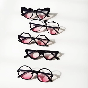 Kids sunglasses with black frames and pink gradient lenses in heart and cat eye shapes