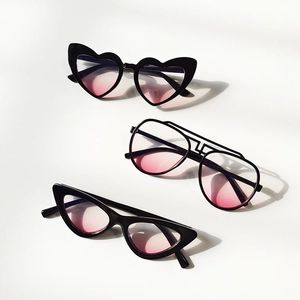 Black frame kids sunglasses with pink gradient lenses in heart and cat eye styles