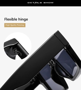 Close-up of flexible metal hinge and high quality painting on black sunglasses frame