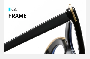 Detail view of glossy black sunglasses frame featuring premium gold metal hinges