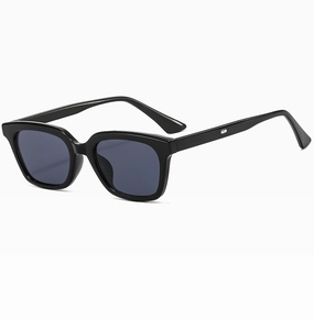 Detail view of stylish square frame sunglasses with black frames and grey lenses