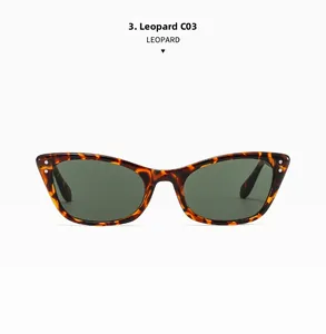 Gros plan de lunettes de soleil œil-de-chat léopard avec rivets argentés et verres verts
