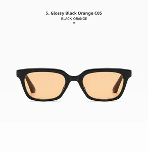 Detail of square vintage sunglasses in bright black frame with orange lenses, model C05