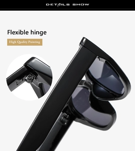 Detailansicht des flexiblen Scharniers einer schwarzen Cat-Eye-Sonnenbrille mit Lackierung