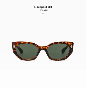 Detail einer Cat-Eye-Sonnenbrille mit Schildpattmuster, Metallnieten und grünen Gläsern