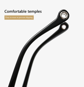 Detail of ergonomic black glossy temples with anti-slip round metal eyelet ends