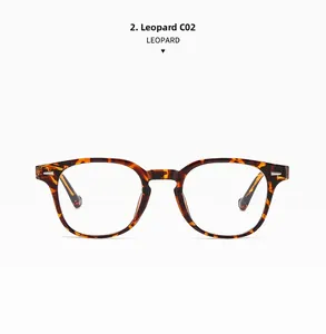 Front view of stylish tortoise shell glasses frame with silver rivets and leopard pattern