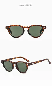 Detail view of retro tortoise shell round sunglasses with G15 dark green lenses