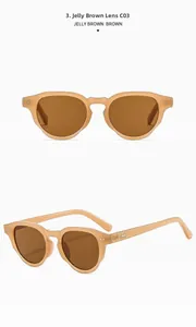Detail view of Jelly Brown round frame sunglasses showing lens size 53-22-145 and rivet decor