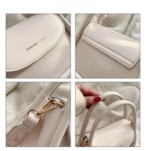 Detailed views of cream leather crossbody bag with gold hardware and embossed text