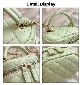 Detail view of mint green quilted vanity bag showing stitching and chain strap
