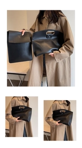 Close-up detail of black leather handbags with embossed ORIGINALLY logo and metal zipper