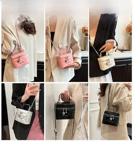 Quilted mini bucket bag in multiple colors with chain strap shown on models