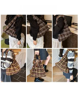 Collage of model showcasing various carrying angles of the large plaid tote bag in daily use