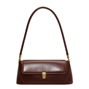 Classic dark brown leather underarm bag with gold buckle and smooth glossy finish