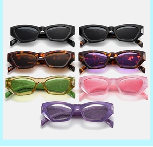 Collection of retro cat-eye sunglasses in various colors and glitter finishes
