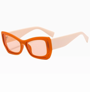 Detailed side view of two-tone square cat-eye sunglasses with wide temples