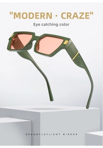 Detail of square sunglasses featuring snake skin texture temples and pink gradient lenses