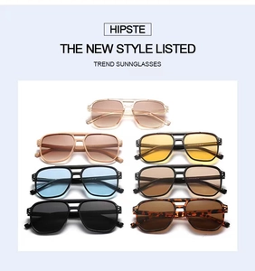 Multiple stylish pilot sunglasses with colorful lenses and dual bridge frames displayed
