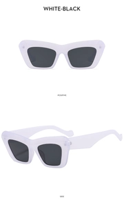 Detailed front and side views of white cat-eye sunglasses with dark black lenses