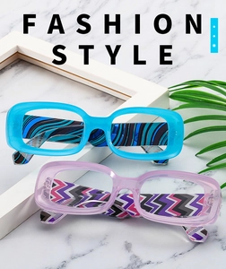 Detail of fashion rectangle glasses with colorful wavy and zigzag patterned temples