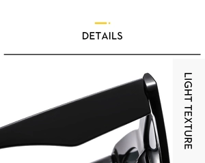 Macro detail of glossy black cat eye sunglasses frame featuring wide temples and light texture