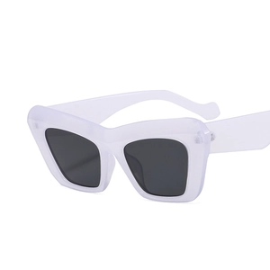 Retro translucent lavender oversized cat-eye sunglasses with dark grey lenses shown at 45 degrees