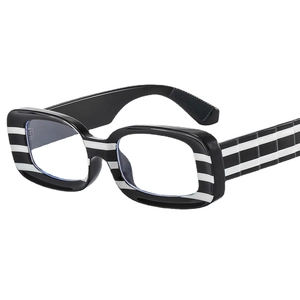 Hip-hop retro glasses with bold black and white striped frames and transparent lenses
