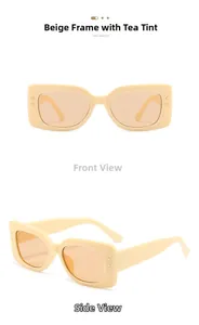 Detail of beige rectangular sunglasses with tea lenses and star-shaped metallic accents