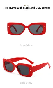 Detail view of red rectangular sunglasses with dark lenses and gold star rivets