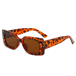 Retro square leopard print sunglasses with star-shaped gold studs and dark brown lenses