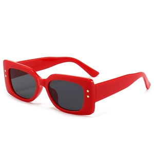 Fashionable red square frame sunglasses with star rivets and dark lenses for women