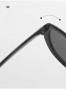 Detail of durable silver metal hinge on vintage oversized black cat-eye sunglasses