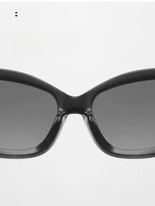 Detail of ergonomic integrated nose pads on black cat-eye sunglasses for comfort