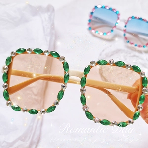 Detailed close-up of fashion square kids sunglasses with hand-set rhinestones and gradient lenses
