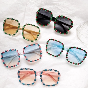 Five pairs of kids square rhinestone sunglasses in various vibrant ocean colors
