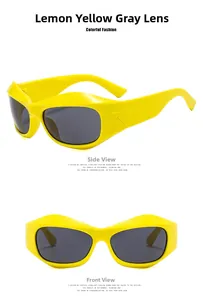 Detail view of lemon yellow Y2K sunglasses with grey lenses and V-shaped geometric temple