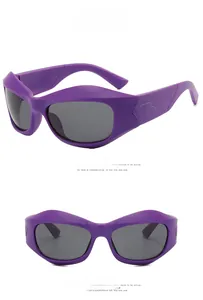 Macro view of purple streamline Y2K sunglasses with grey lenses and geometric temples